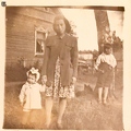 1949,во дворе дома,Ида Григорьевна и Влад Николаевич с дочкой Галей